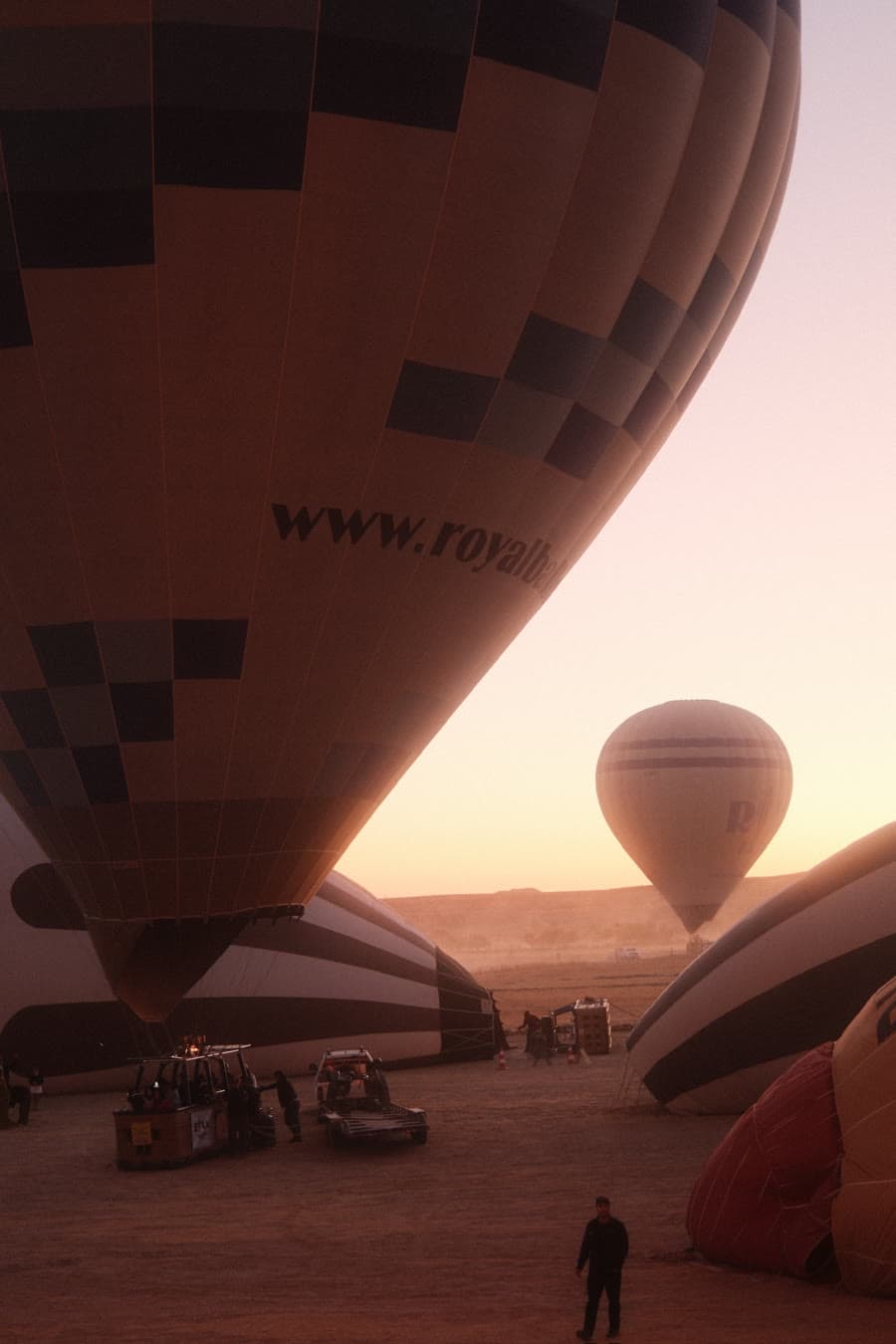 Balloons filling at dawn