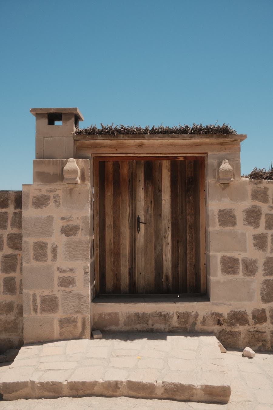 A stone doorway in the sun